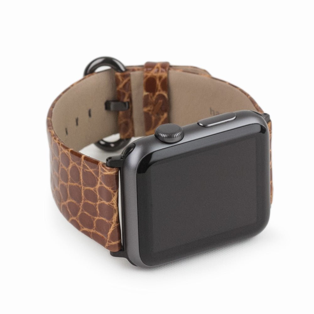 gold alligator strap apple watch black adapters and buckle frontal view