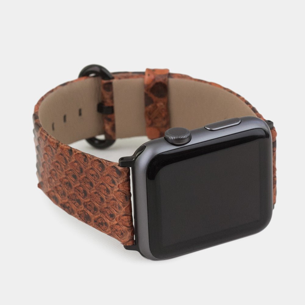 gold  python strap apple watch with black adapters and buckle frontal view