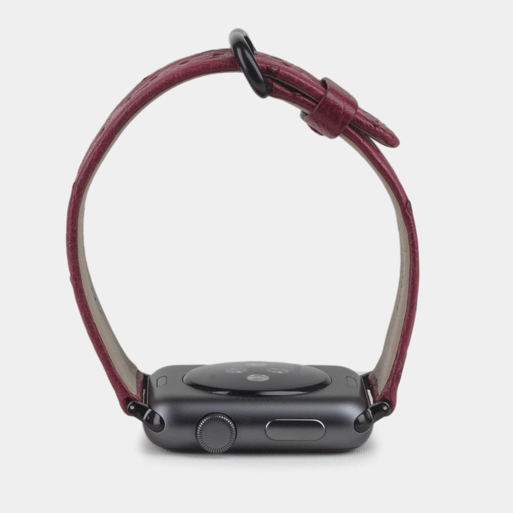pink ostrich strap apple watch black adapters and buckle profile view