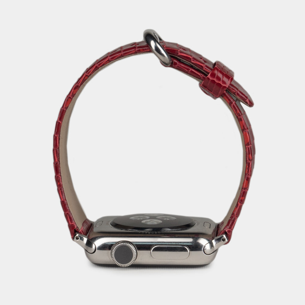 red lizard strap Apple Watch with steel adapters and buckle profile view